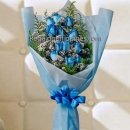 Blue Roses In A Bouquet